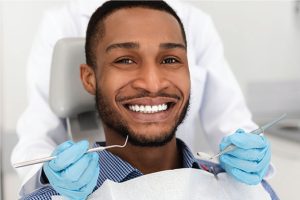man getting a dental exam