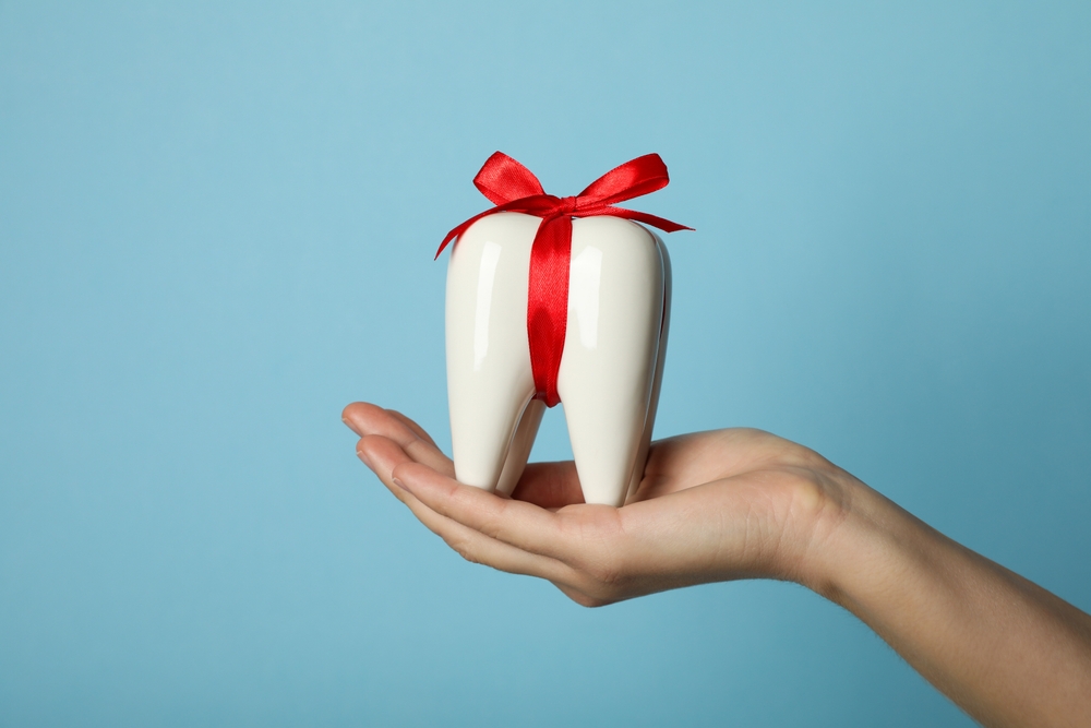 model of tooth wraped like present